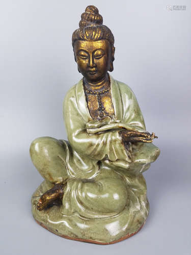 A LONGQUAN GILT-BRONZE GUANYIN