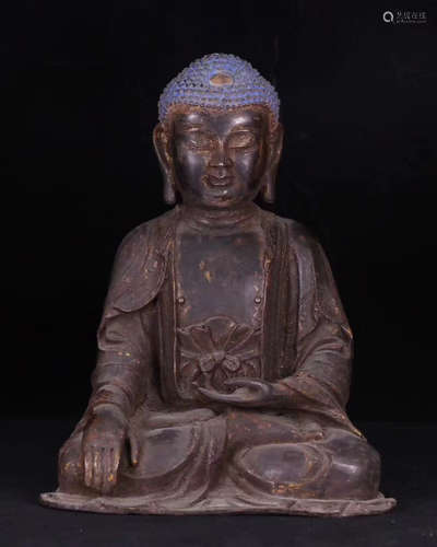 A BRONZE BUDDHA FIGURE