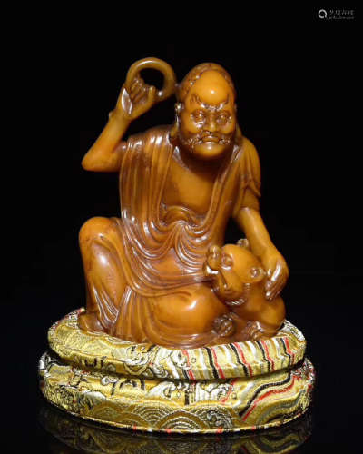A TIANHUANG STONE MONK FIGURE