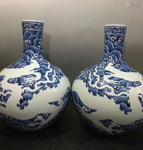 A BLUE WAVE AND WHITE DRAGON PATTERN VASE