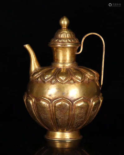 A BRONZE GLITED WINE EWER