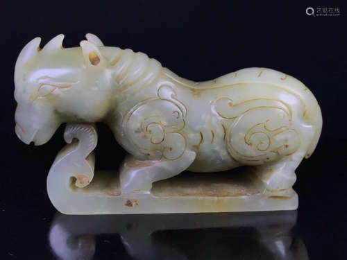 A HETIAN JADE RHINO ORNAMENT