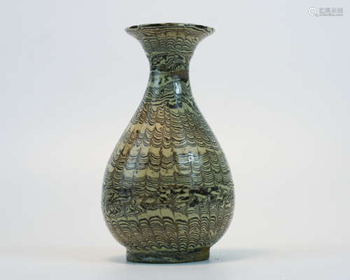 A WAVE PATTERN PEAR SHAPED VASE