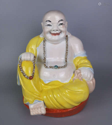 A MAITREYA FIGURE