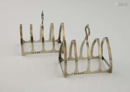 Pair of George V silver four division toast racks