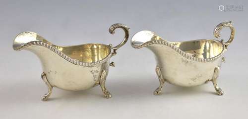 Pair of George V silver sauce boats with gadrooned