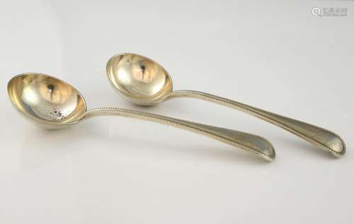 Pair of Victorian silver bead pattern sauce ladles