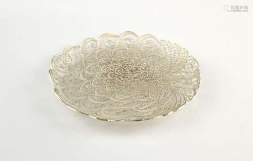 Silver filigree dish in the form of a displaying p