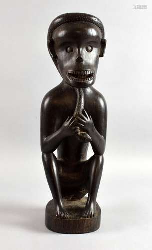 Malaysian Sarawak single piece carving of man wit