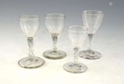 Four 18th century sherry/wine glasses all with fac