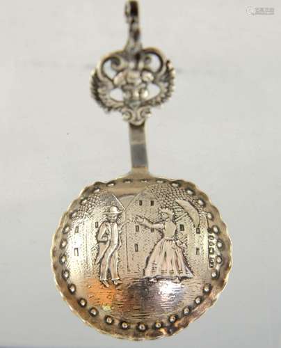 Continental silver caddy spoon, with street scene