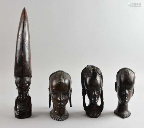 Collection of four 20th C African wooden heads, ca