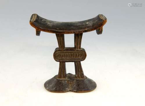 African carved wood headrest, possibly South Afric