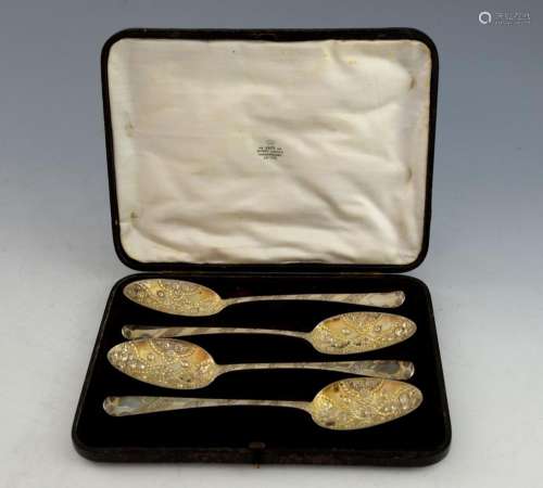 Matched set of four George III silver berry spoons
