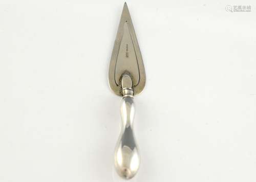 Silver bookmark in the form of a trowel with fille