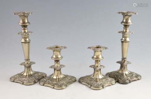 Pair of foliate cast silver plated candle sticks,