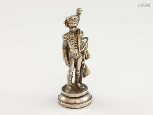 Silver figurine of a soldier, on filled base, with