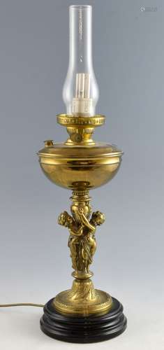 Brass oil lamp the stand with two embracing cherub