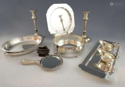 Pair of silver plated candlesticks, tureens, and o