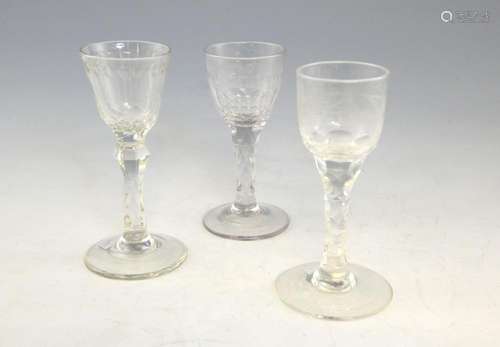 Three 18th century wine glasses, one with bird and