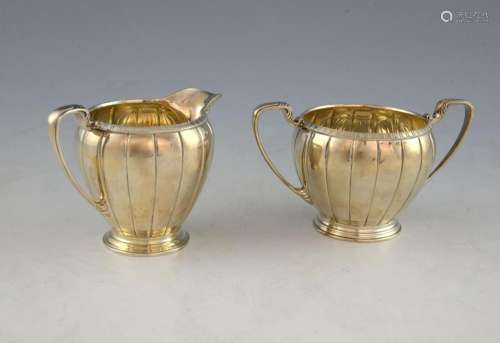 George V silver cream jug and sugar bowl with ribb