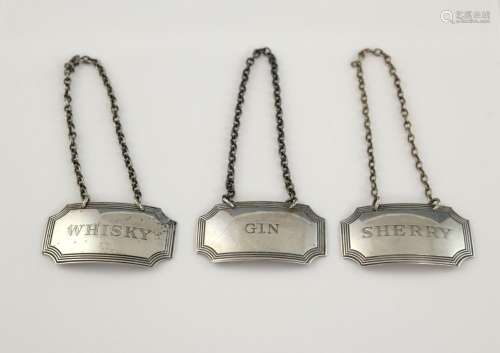 Set of three modern silver decanter labels with li