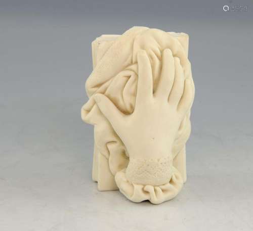 Parianware paperweight in the form of a hand resti