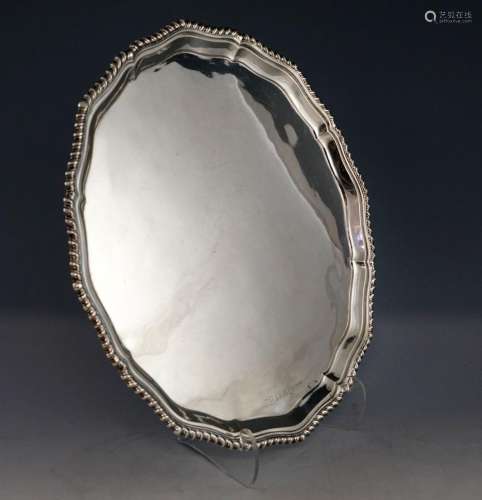 George V silver salver with serpentine gadrooned r