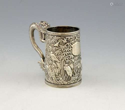 MId/late 19th century Chinese silver mug with drag