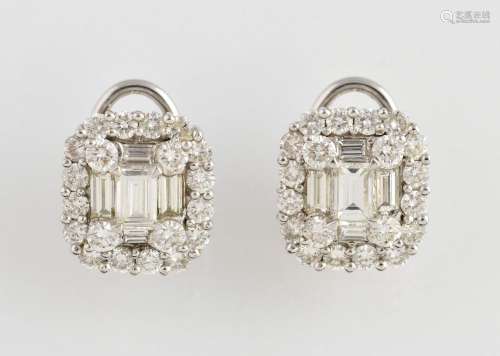 A pair of diamond cluster earrings, with central b