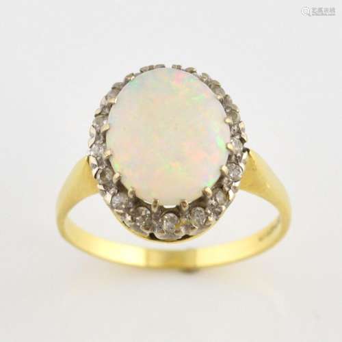 Vintage opal and diamond ring, central oval caboch