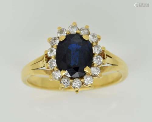Sapphire and diamond cluster ring, oval cut sapphi