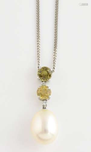 Yellow sapphire and pearl drop pendant, two round