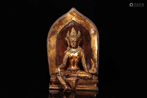 A BRONZE GILDING GUANYIN STATUE