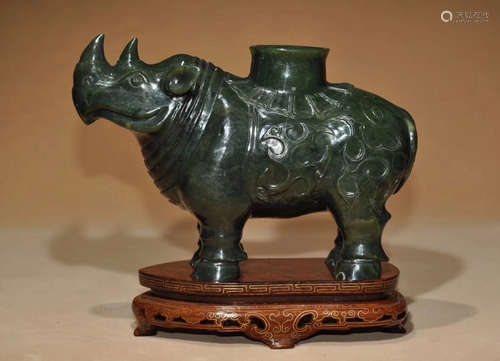 1912-1949, A RHINO DESIGN GREEN JADE ORNAMENT, THE REPUBLIC OF CHINA