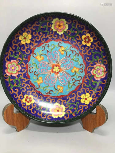 AN ENAMEL FLOWER PATTERN PLATE