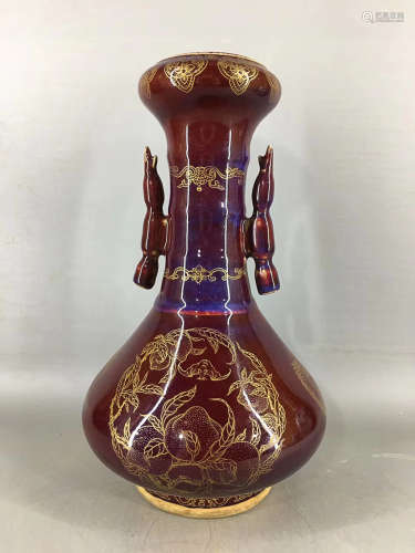 A RED GLAZED FLOWER PATTERN DOUBLE-EAR VASE