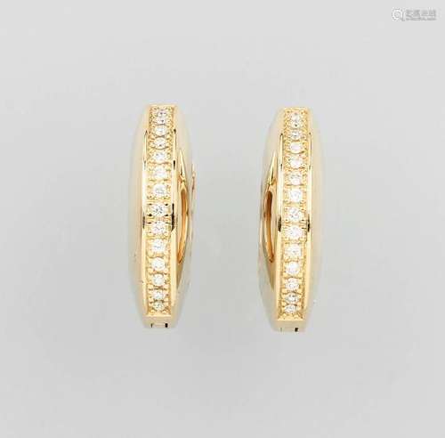 Pair of 14 kt gold hoop earrings with brilliants