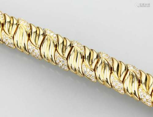 Massive 18 kt gold bracelet with brilliants