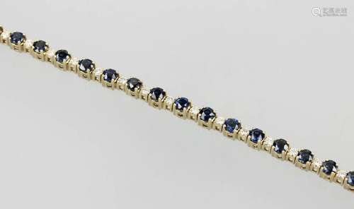 14 kt gold bracelet with brilliants and sapphires