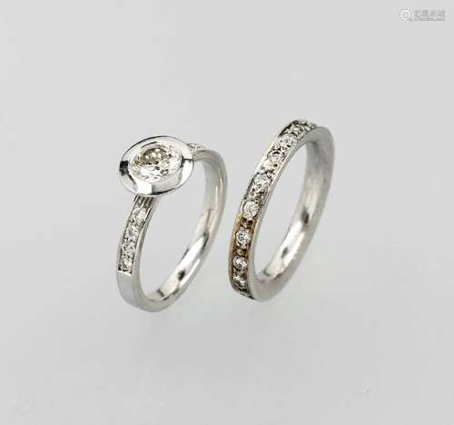 Lot 2 18 kt gold rings with diamonds