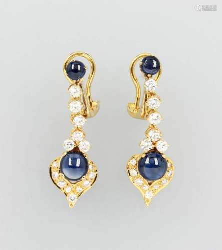 Pair of 18 kt gold earrings with sapphires