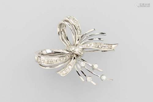 14 kt gold bow brooch with diamonds