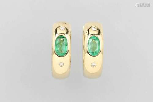 Pair of 14 kt gold CHRIST hoop earrings with emeralds