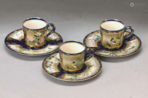 three cups with saucers