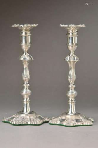 couple of silver candle holders