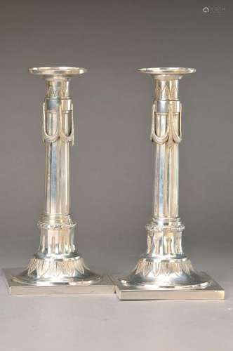 couple of silver candle holders