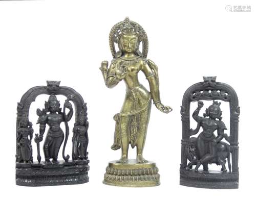 Sino-Tibetan, 19th century A bronze standing Tara and a pair of wood carvings