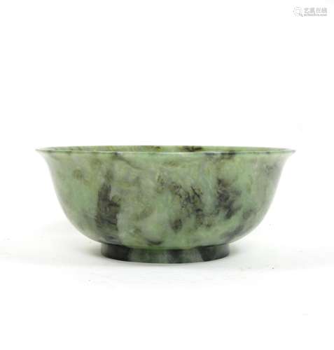 Early 20th century A carved mottled green hardstone bowl