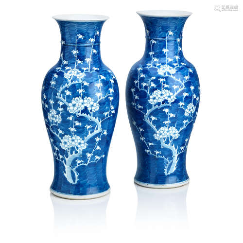 Bearing Kangxi six-character marks, but 19th century A pair of large blue and white vases